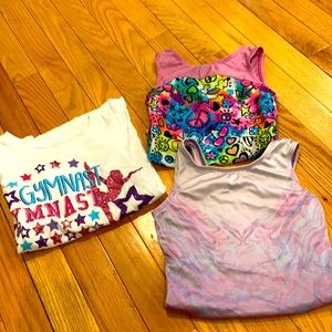 Lot of 3 items- two leotards and T-shirt.